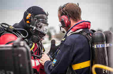 Coast Guard divers prepare for dives