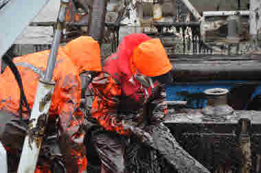 Oil is taken care of on board a coastguard vessel